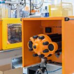 Spuitgiet - Orange Plastics